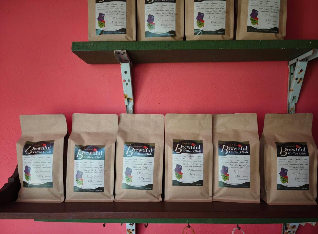 Bags of roasted coffee beans
